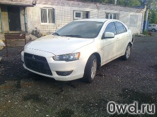 Битый автомобиль Mitsubishi Lancer