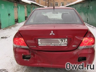 Битый автомобиль Mitsubishi Lancer