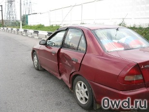 Битый автомобиль Mitsubishi Lancer