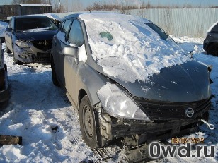 Битый автомобиль Nissan Tiida