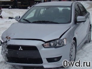 Битый автомобиль Mitsubishi Lancer