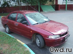 Битый автомобиль Mitsubishi Lancer