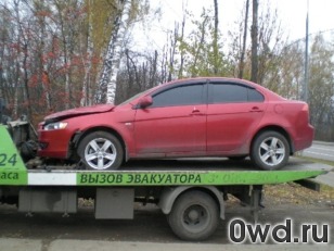 Битый автомобиль Mitsubishi Lancer