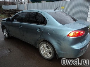 Битый автомобиль Mitsubishi Lancer