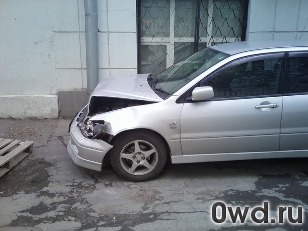 Битый автомобиль Mitsubishi Lancer Cedia