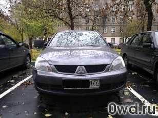 Битый автомобиль Mitsubishi Lancer