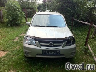 Битый автомобиль Mazda Tribute