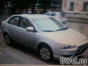 Битый автомобиль Mitsubishi Lancer