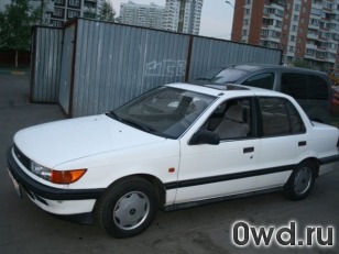 Битый автомобиль Mitsubishi Lancer