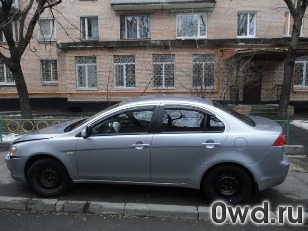 Битый автомобиль Mitsubishi Lancer