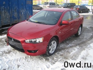 Битый автомобиль Mitsubishi Lancer