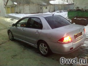 Битый автомобиль Mitsubishi Lancer