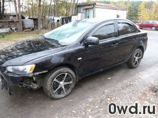 Битый автомобиль Mitsubishi Lancer