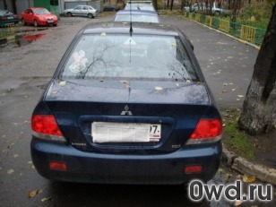 Битый автомобиль Mitsubishi Lancer