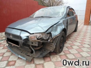 Битый автомобиль Mitsubishi Lancer