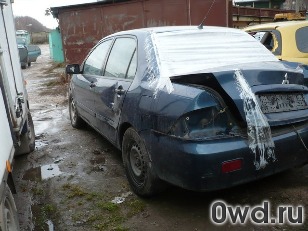 Битый автомобиль Mitsubishi Lancer