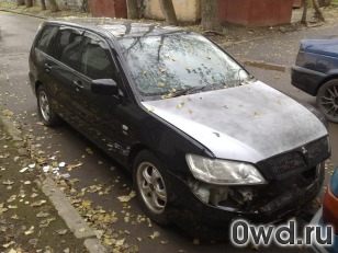 Битый автомобиль Mitsubishi Lancer Cedia