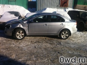 Битый автомобиль Mitsubishi Lancer