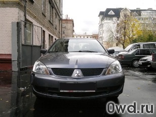 Битый автомобиль Mitsubishi Lancer