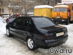 Битый автомобиль Mitsubishi Lancer