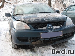 Битый автомобиль Mitsubishi Lancer