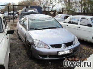 Битый автомобиль Mitsubishi Lancer