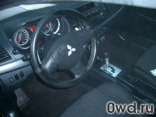 Битый автомобиль Mitsubishi Lancer