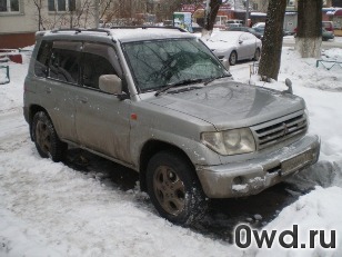 Битый автомобиль Mitsubishi Pajero IO