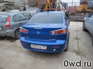 Битый автомобиль Mitsubishi Lancer