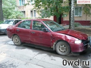 Битый автомобиль Mitsubishi Lancer