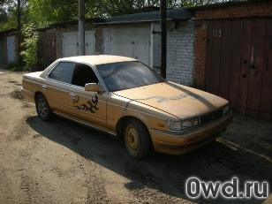 Битый автомобиль Nissan Laurel