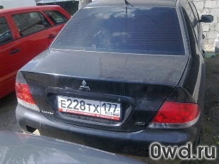 Битый автомобиль Mitsubishi Lancer