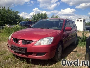 Битый автомобиль Mitsubishi Lancer