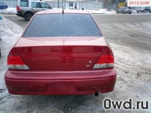 Битый автомобиль Mitsubishi Lancer Cedia