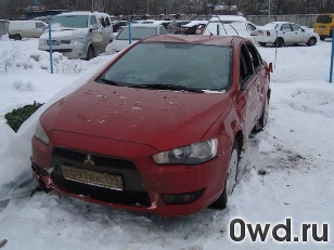 Битый автомобиль Mitsubishi Lancer