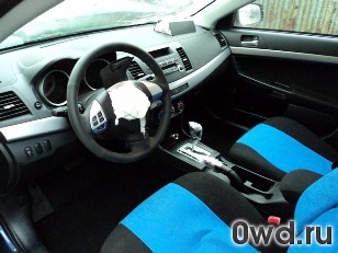 Битый автомобиль Mitsubishi Lancer