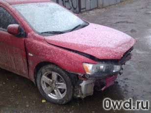 Битый автомобиль Mitsubishi Lancer