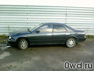 Битый автомобиль Nissan Bluebird