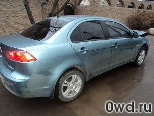 Битый автомобиль Mitsubishi Lancer