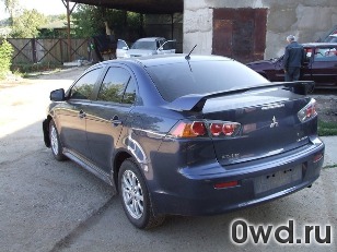 Битый автомобиль Mitsubishi Lancer