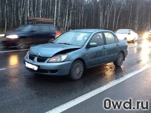 Битый автомобиль Mitsubishi Lancer