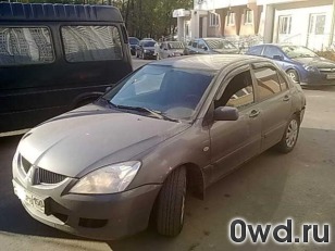 Битый автомобиль Mitsubishi Lancer