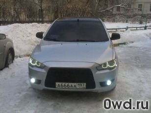 Битый автомобиль Mitsubishi Lancer