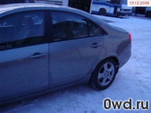 Битый автомобиль Nissan Primera