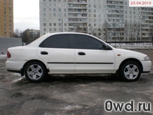 Битый автомобиль Mazda 323